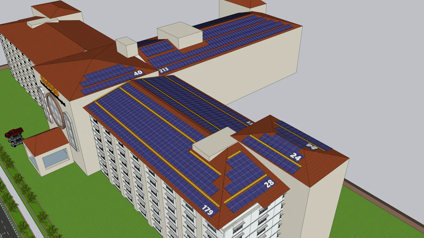 Solar arrays across the roofs of a district hospital in South Goa